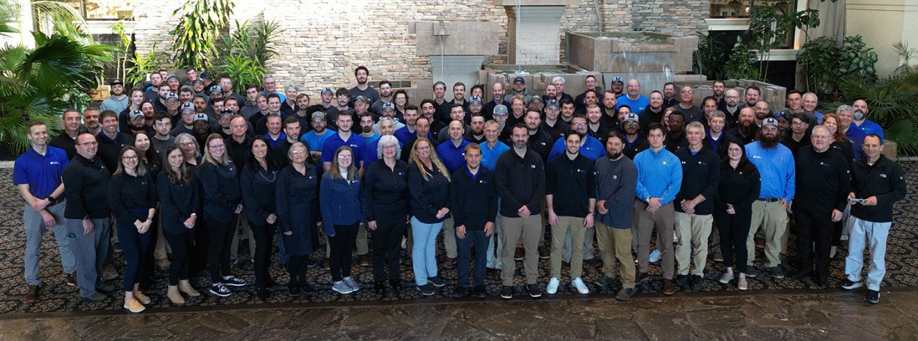 A large group photo of the Paradise Energy Solutions team.