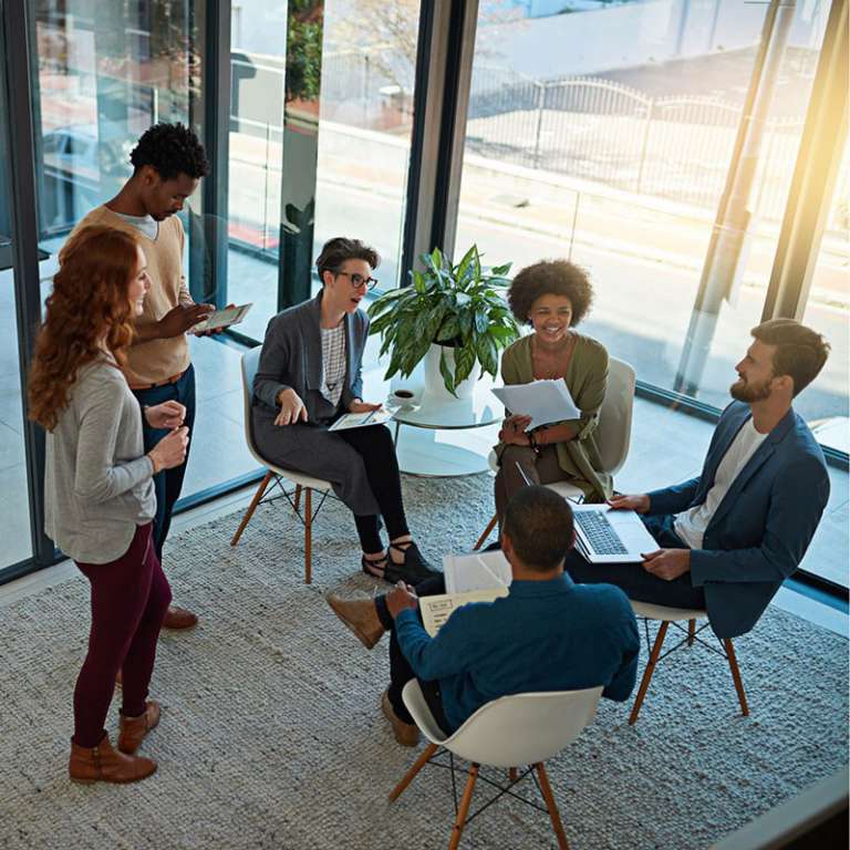 Business Meeting with Laptops