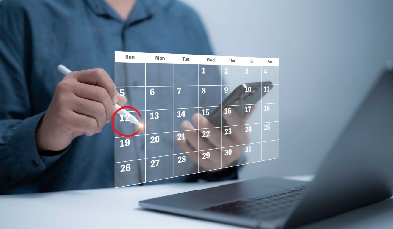 Employee updating a digital calendar