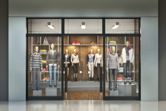 mannequins dressed in a store front window